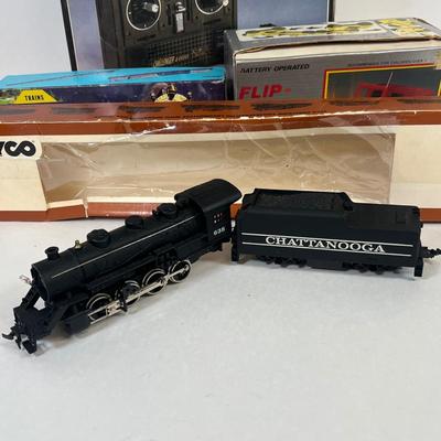 LOT 35: Vintage Toys - Tyco Locomotive, RC Controller and More