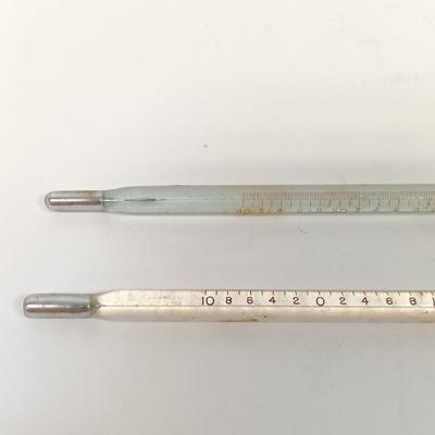 LOT 57: Vintage H-B Instrument Shoulder Immersion Glass Thermometer, Tycos Rochester Gas-Filled Glass Thermometers & Haslam Forceps