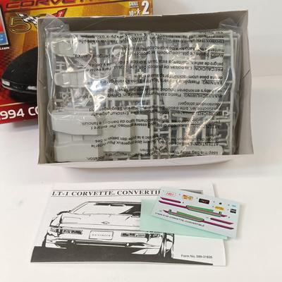 LOT 62: Revell Die-cast 97' Monte Carlo, Ertl 94' Convertible, Signed Martin Truex Jr Photo & Dale Jarett Figurine