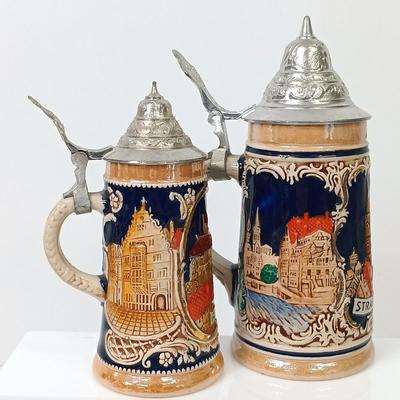 LOT 66: Goebel Hummel Sister Figurine, Shawnee Pennsylvania Dutch Creamer & German Made Steins