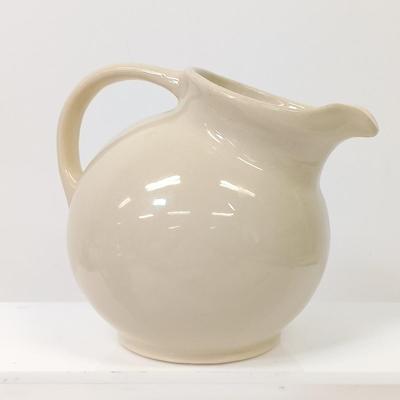 LOT 66: Goebel Hummel Sister Figurine, Shawnee Pennsylvania Dutch Creamer & German Made Steins