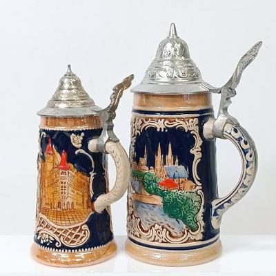 LOT 66: Goebel Hummel Sister Figurine, Shawnee Pennsylvania Dutch Creamer & German Made Steins