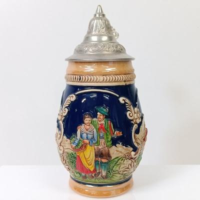 LOT 66: Goebel Hummel Sister Figurine, Shawnee Pennsylvania Dutch Creamer & German Made Steins