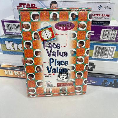 LOT 94: Collection of Board Games - Star Wars Mandalorian Monopoly and More - NIP