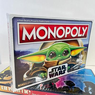 LOT 94: Collection of Board Games - Star Wars Mandalorian Monopoly and More - NIP