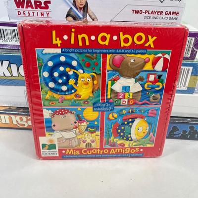 LOT 94: Collection of Board Games - Star Wars Mandalorian Monopoly and More - NIP