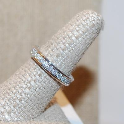 Size 6¼ Infinity Style Ring with Full Row of Round Clear Stones on a Silver Tone Band (4.4g)