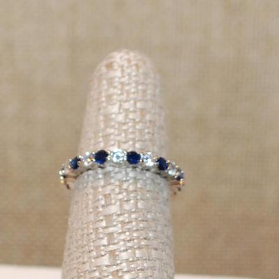 Size 6¼ Infinity Style Ring with Blue & Clear Alternating Stones on a Silver Tone Band (2.3g)
