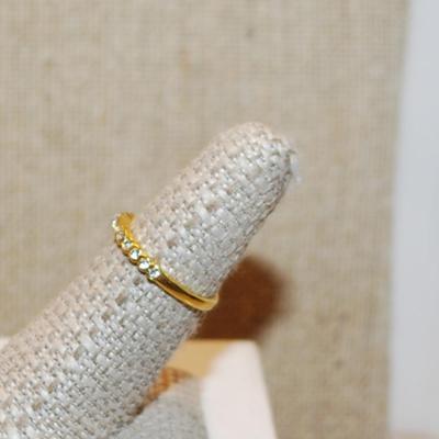 Size 6¾ Semi Infinity Ring with 15 Round Clear Stones on a Gold Tone Band (1.6g)