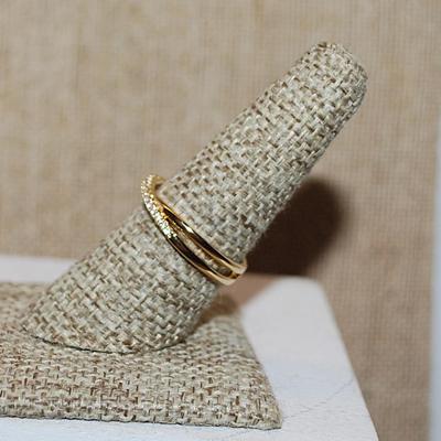 Size 8 Half Infinity Criss-Cross Ring with 2 Rows of Small Stone Accents on a Gold Tone Band (2.6g)