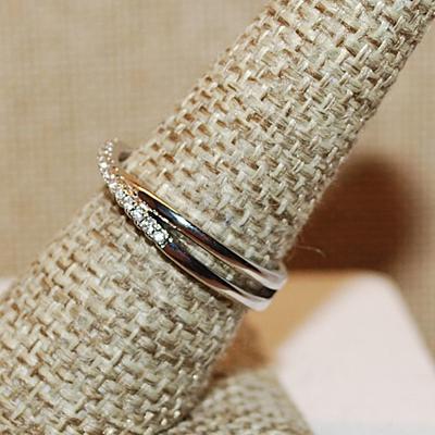 Size 8 Half Infinity Criss-Cross Ring with 2 Rows of Small Stone Accents on a Silver Tone Band (2.4g)