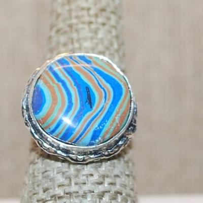 Size 7 Marked .925 Round RAINBOW CALSILICA Gemstone Ring with Full Slanted Lines in Blues & Orange and Silver-Plated Band (5.4g)