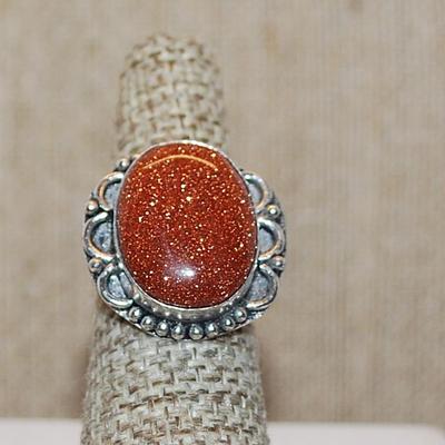 Size 6 Large Oval Glittery Rust Colored SUNSTONE Gemstone Ring with Silver Tone Band (7.5g)