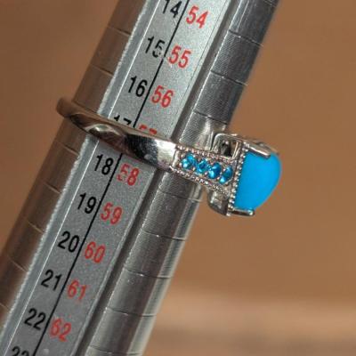 STS 925 Sterling silver wring with trillion shaped turquoise stone size 8