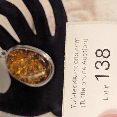 Large oval baltic amber pendant in silver- no markings