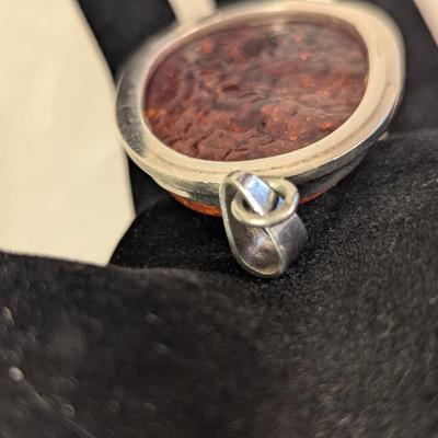 Large oval baltic amber pendant in silver- no markings