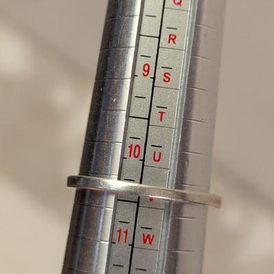 Sterling silver ring with lue topaz and diamond or cz accents