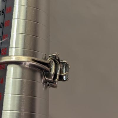 Sterling silver ring with lue topaz and diamond or cz accents