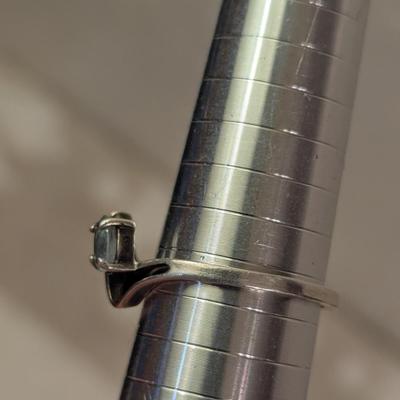 Sterling silver ring with lue topaz and diamond or cz accents