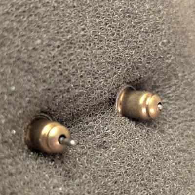 necklace and earrings set with green stones