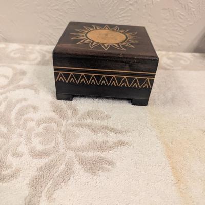 wooden trinket box with sun face image