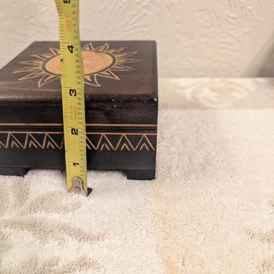 wooden trinket box with sun face image