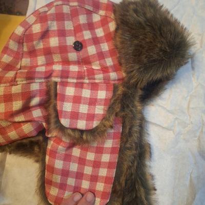 red and white plaid trapper hat with faux fur trim