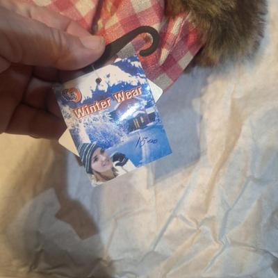 red and white plaid trapper hat with faux fur trim