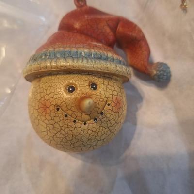 vintage-style snowman Christmas ornament with a crackled style finish