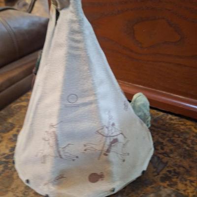 miniature decorative teepee collectible- opens to display people inside