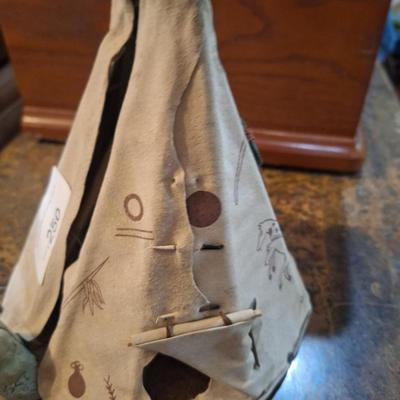 miniature decorative teepee collectible- opens to display people inside