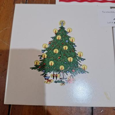 2 Christmas themed ceramic tiles