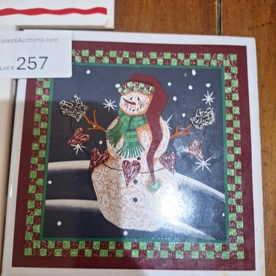 2 Christmas themed ceramic tiles