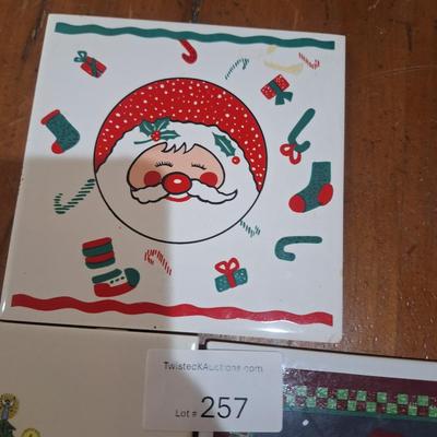 2 Christmas themed ceramic tiles