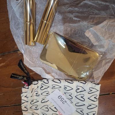 Estee Lauder 2 lipsticks and one compact