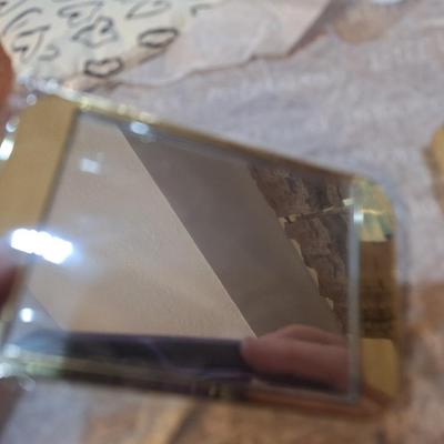 Estee Lauder 2 lipsticks and one compact