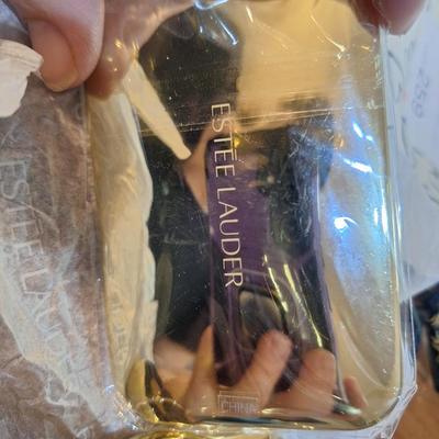 Estee Lauder 2 lipsticks and one compact