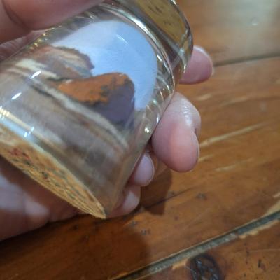 Native American "Painted Desert Sands" sand art shot glass.