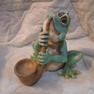 frog playing saxophone figurine