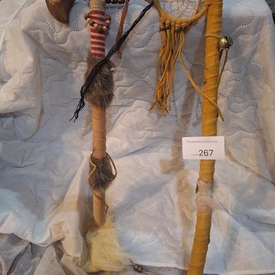 Native American-style decorative tomahawks or war clubs,