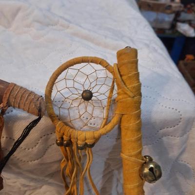 Native American-style decorative tomahawks or war clubs,