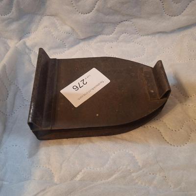 vintage or antique iron or sad iron holder.