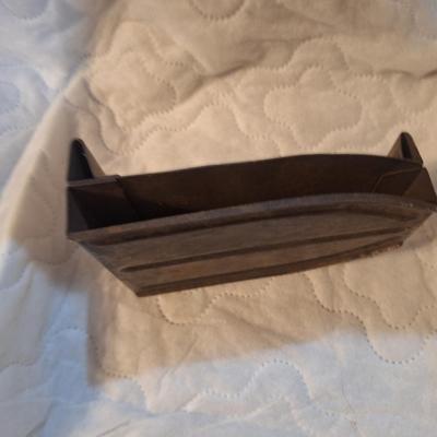 vintage or antique iron or sad iron holder.