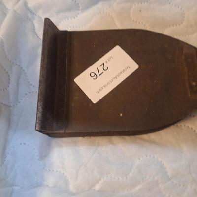 vintage or antique iron or sad iron holder.