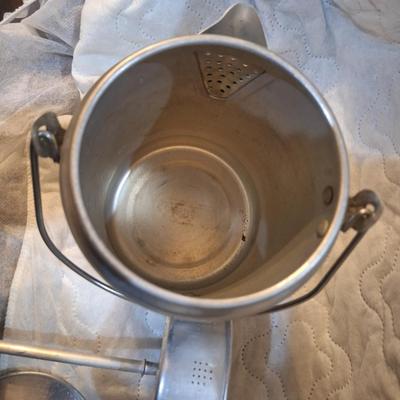 vintage or camping aluminum coffee percolator.