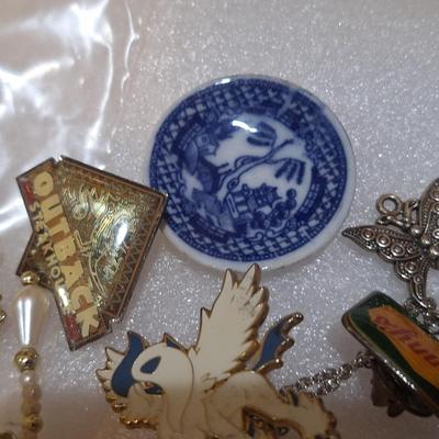 assorted vintage and estate brooches, mis matched earrings and other jewelry pieces- some may be broken