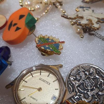 assorted vintage and estate brooches, mis matched earrings and other jewelry pieces- some may be broken