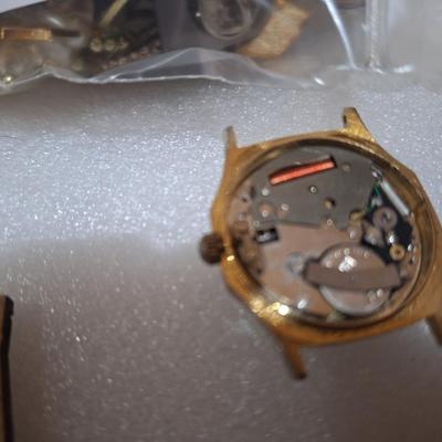 assorted vintage and estate brooches, mis matched earrings and other jewelry pieces- some may be broken