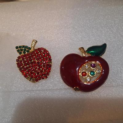 two vintage apple brooches