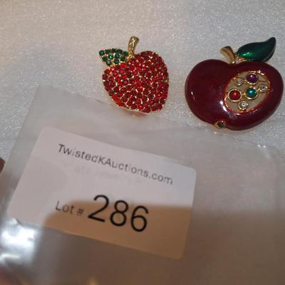 two vintage apple brooches